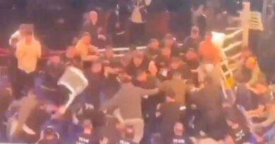 Boxing fight descends into mass brawl as coach hospitalised | Boxing | Sport