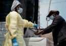 Experts discuss Ebola threat to US as American tests positive for virus