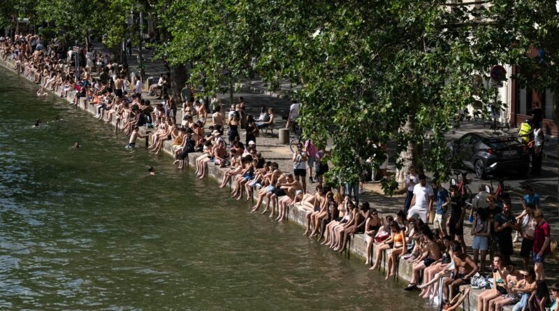Paris halts alcohol sales to help hospitals amid deadly heat wave, as scientists blame human-caused climate change