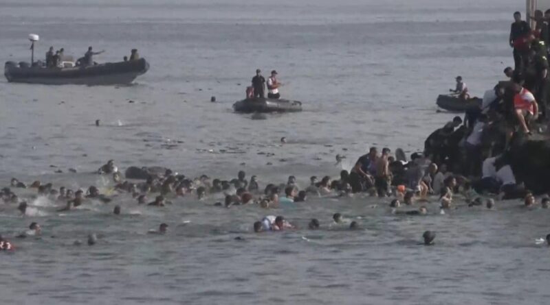 Thousands of migrants cross into Spain’s tiny Ceuta territory, some die in journey Thousands of migrants cross into Spain’s tiny Ceuta territory, some die in journey