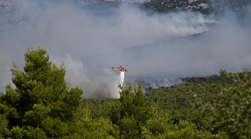 Firefighting helicopters collide midair in Greece as wildfires rage across Europe Firefighting helicopters collide midair in Greece as wildfires rage across Europe