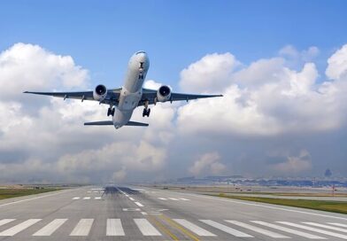 Horror moment laptop EXPLODES on packed flight burning 5 passengers