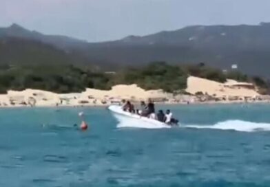 Horror as migrant boat crashes into and injures swimmer