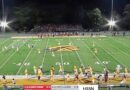American football match ends suddenly as gunshots heard and players and cheerleaders flee