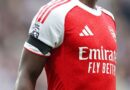 Why are Arsenal wearing black armbands against Lille tonight?